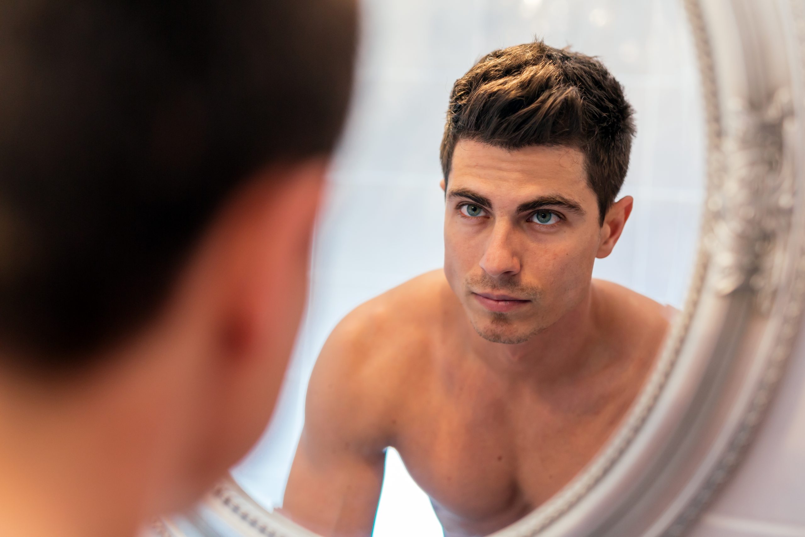 Handsome man in mirror